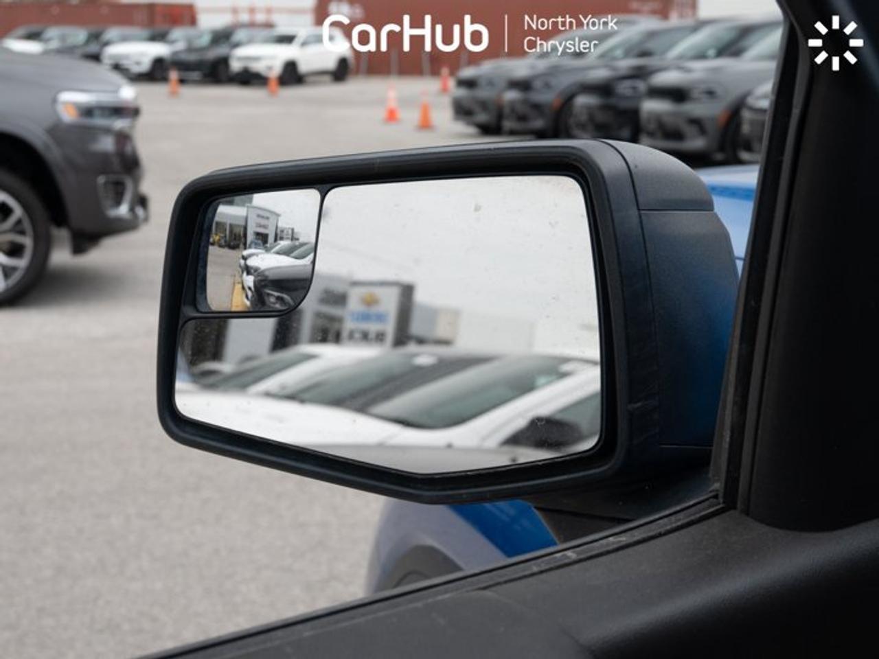 2023 GMC Sierra 1500 157" Elevation Apple CarPlay Android Auto Side Steps Trailering Package High-Capacity Suspension Photo