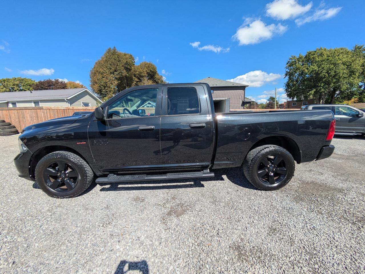 2018 RAM 1500 4x4 Quad Cab 6'4" Box Photo1