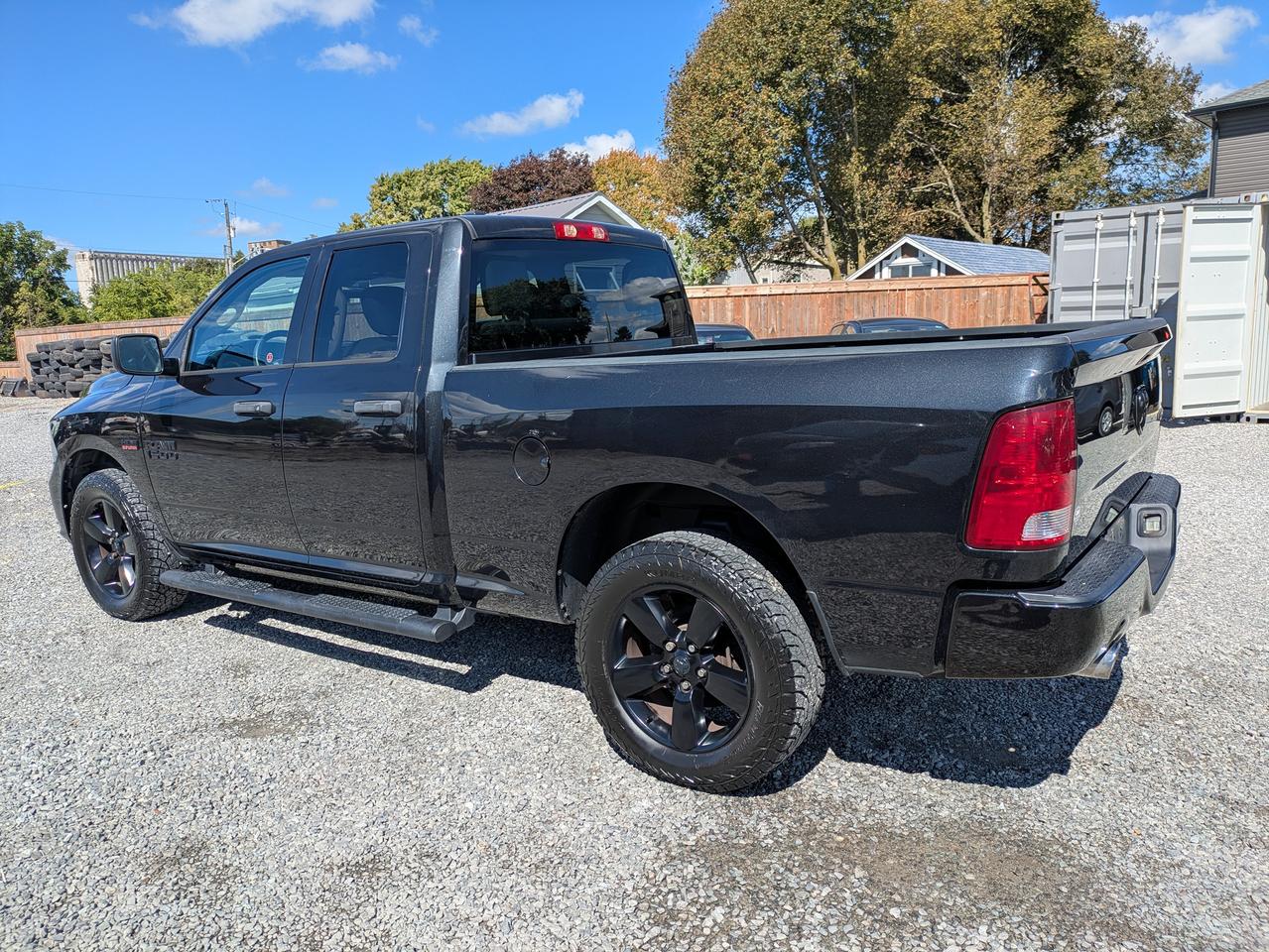 2018 RAM 1500 4x4 Quad Cab 6'4" Box Photo2