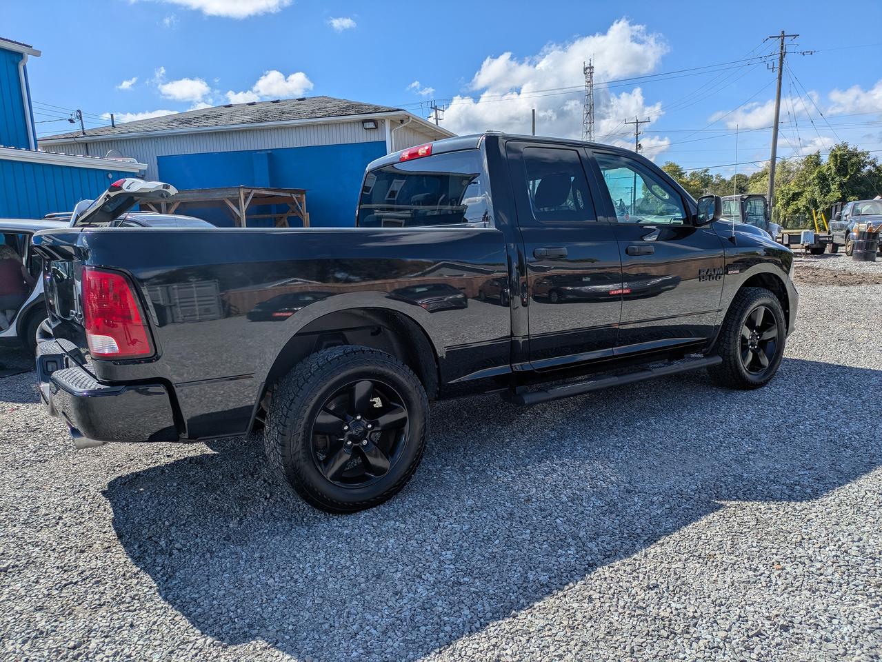 2018 RAM 1500 4x4 Quad Cab 6'4" Box Photo4