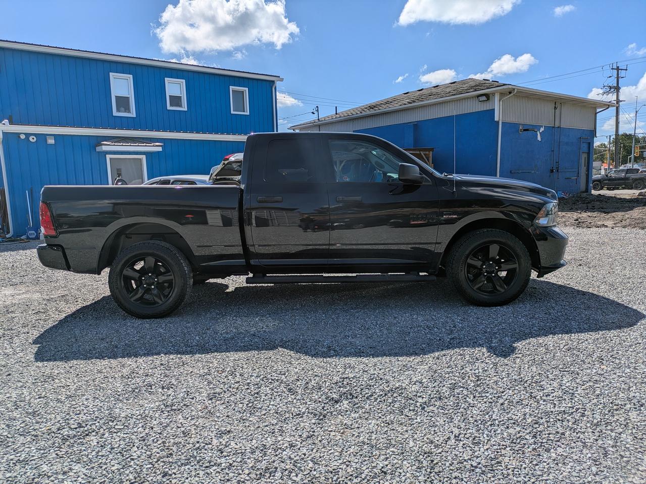 2018 RAM 1500 4x4 Quad Cab 6'4" Box Photo