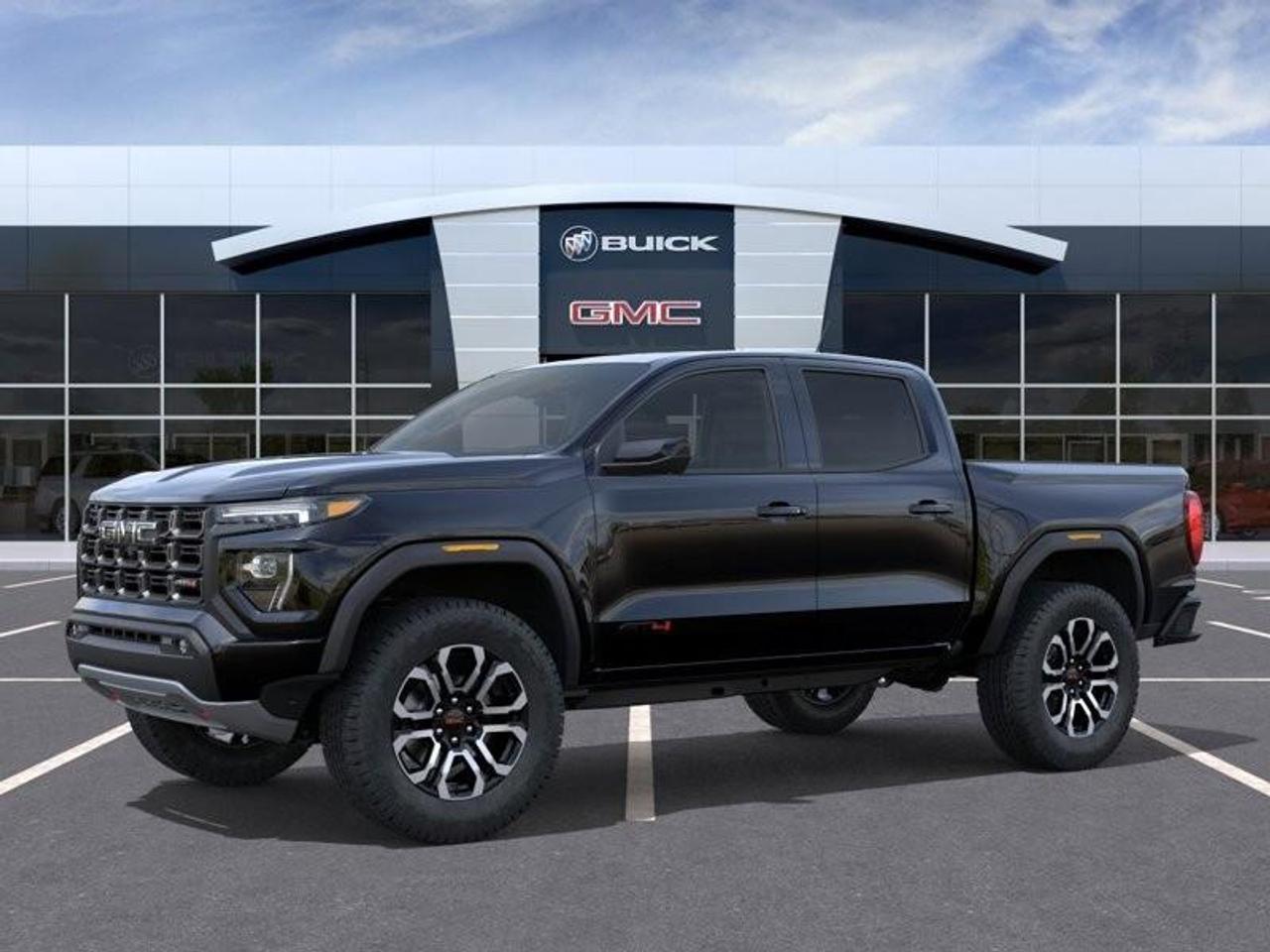 2026 GMC Canyon AT4 New 5 Passenger Mid Size 4X4 Crew Cab Truck with Heated and Ventilated Front Seats, Power Front Seats, Heated Steering Wheel, Adaptive Cruise Control, Power Sunroof and a 11 Diagonal Touchscreen Radio Photo