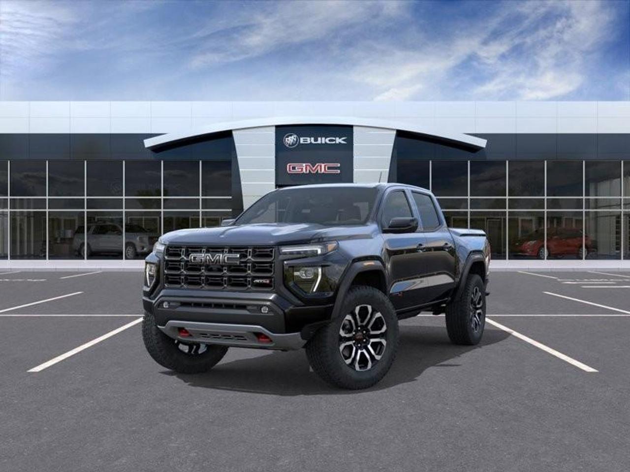 2026 GMC Canyon AT4 New 5 Passenger Mid Size 4X4 Crew Cab Truck with Heated and Ventilated Front Seats, Power Front Seats, Heated Steering Wheel, Adaptive Cruise Control, Power Sunroof and a 11 Diagonal Touchscreen Radio Photo