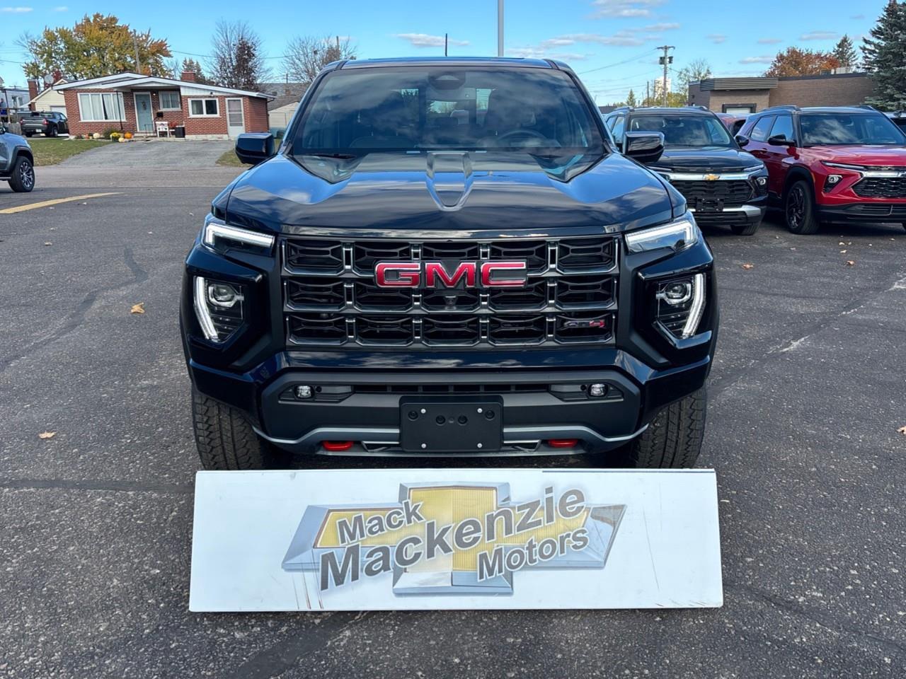 2026 GMC Canyon AT4 New 5 Passenger Mid Size 4X4 Crew Cab Truck with Heated and Ventilated Front Seats, Power Front Seats, Heated Steering Wheel, Adaptive Cruise Control, Power Sunroof and a 11 Diagonal Touchscreen Radio Photo