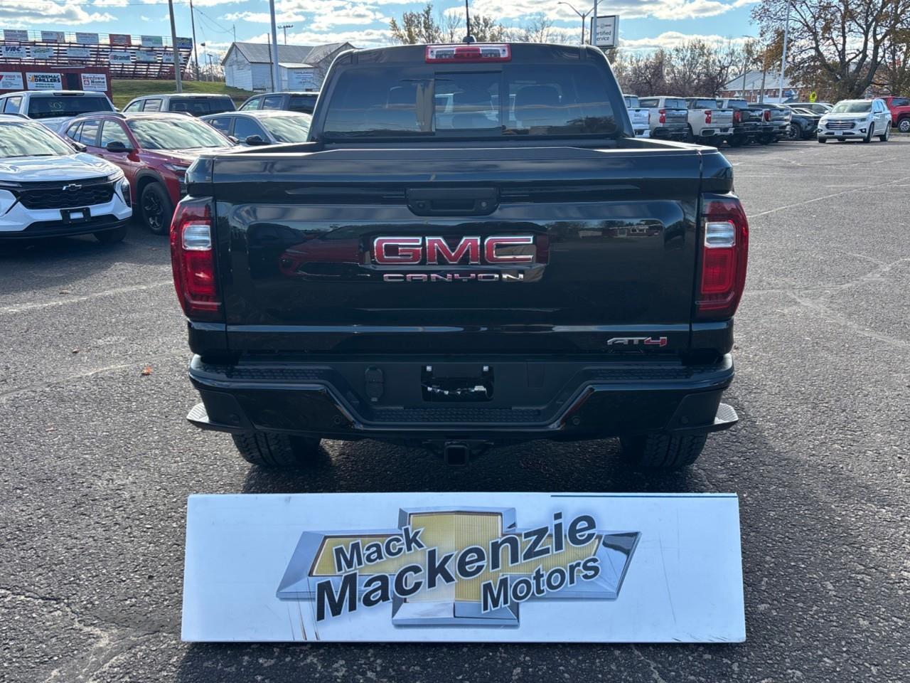 2026 GMC Canyon AT4 New 5 Passenger Mid Size 4X4 Crew Cab Truck with Heated and Ventilated Front Seats, Power Front Seats, Heated Steering Wheel, Adaptive Cruise Control, Power Sunroof and a 11 Diagonal Touchscreen Radio Photo