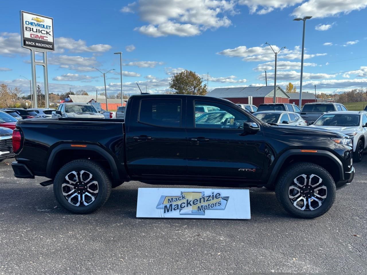 2026 GMC Canyon AT4 New 5 Passenger Mid Size 4X4 Crew Cab Truck with Heated and Ventilated Front Seats, Power Front Seats, Heated Steering Wheel, Adaptive Cruise Control, Power Sunroof and a 11 Diagonal Touchscreen Radio Photo2
