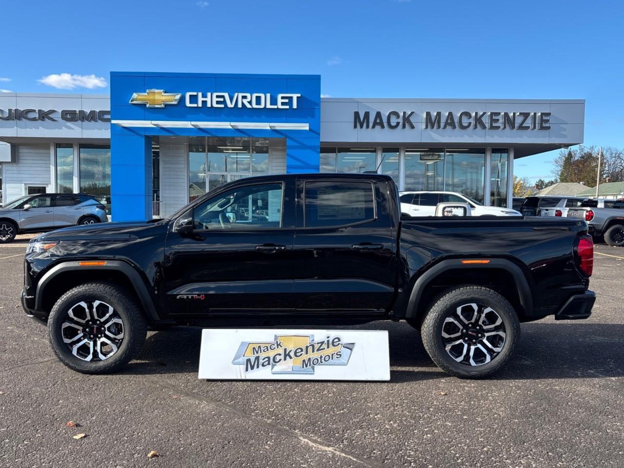 2026 GMC Canyon AT4 New 5 Passenger Mid Size 4X4 Crew Cab Truck with Heated and Ventilated Front Seats, Power Front Seats, Heated Steering Wheel, Adaptive Cruise Control, Power Sunroof and a 11 Diagonal Touchscreen Radio Photo