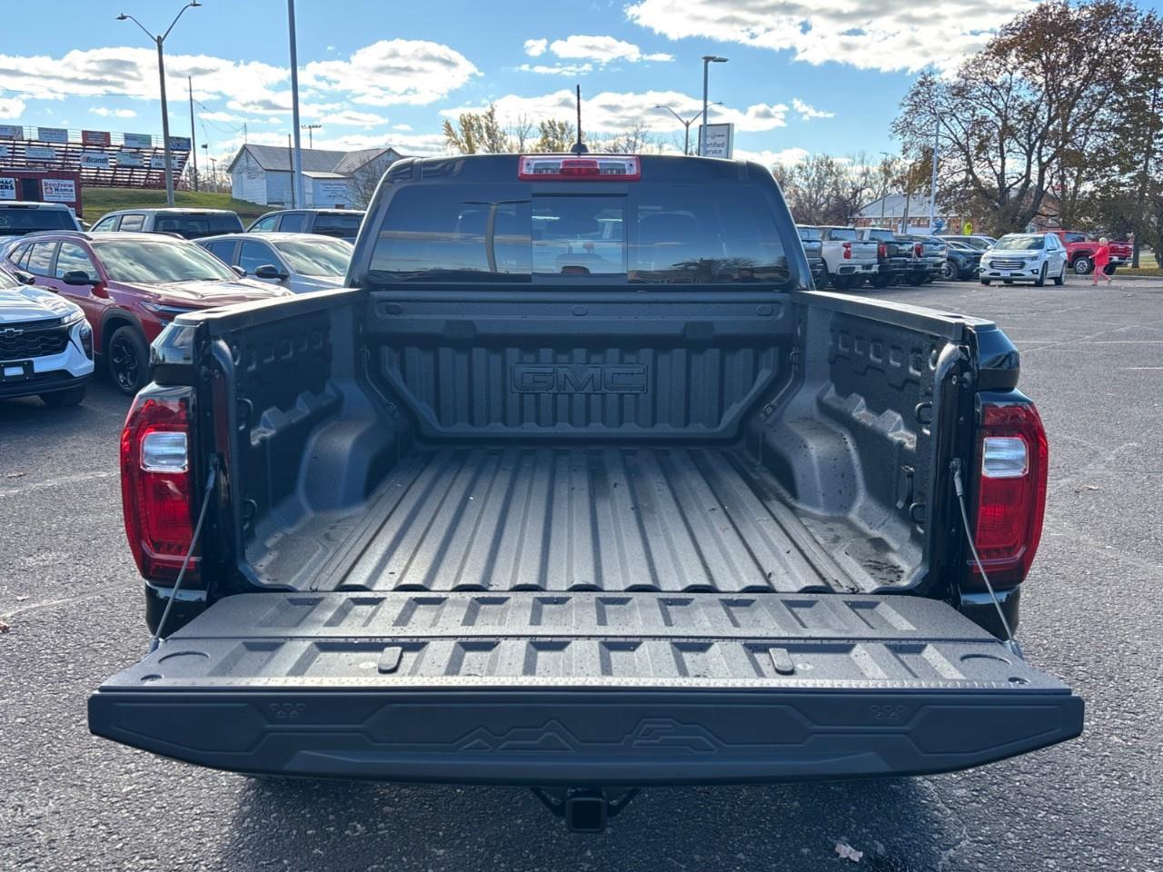 2026 GMC Canyon AT4 New 5 Passenger Mid Size 4X4 Crew Cab Truck with Heated and Ventilated Front Seats, Power Front Seats, Heated Steering Wheel, Adaptive Cruise Control, Power Sunroof and a 11 Diagonal Touchscreen Radio Photo