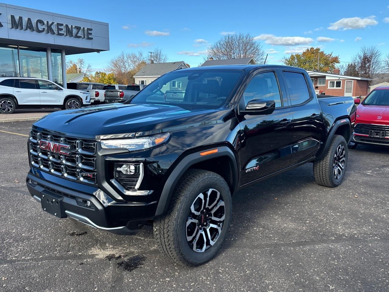 2026 GMC Canyon AT4 New 5 Passenger Mid Size 4X4 Crew Cab Truck with Heated and Ventilated Front Seats, Power Front Seats, Heated Steering Wheel, Adaptive Cruise Control, Power Sunroof and a 11 Diagonal Touchscreen Radio Photo