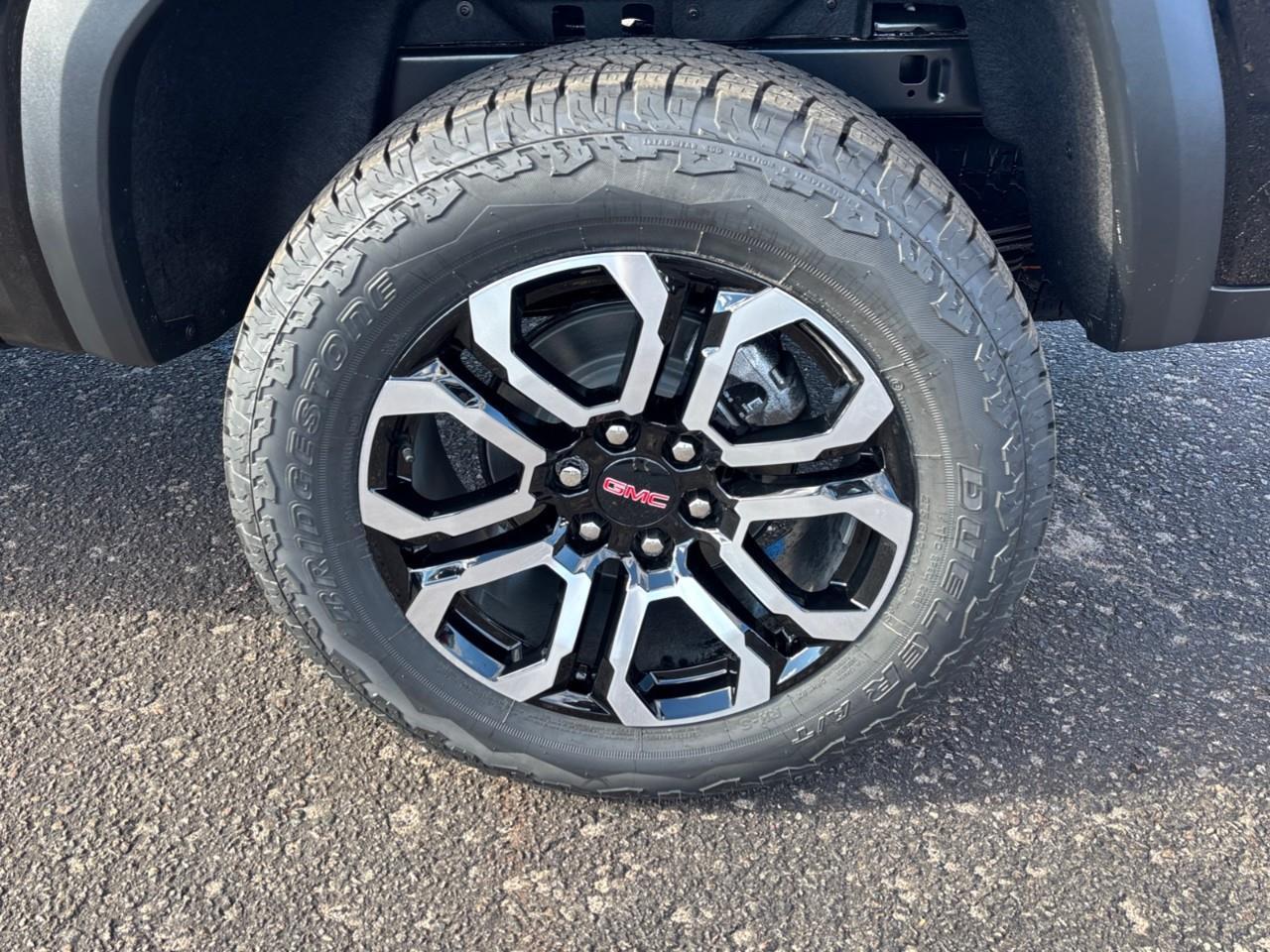2026 GMC Canyon AT4 New 5 Passenger Mid Size 4X4 Crew Cab Truck with Heated and Ventilated Front Seats, Power Front Seats, Heated Steering Wheel, Adaptive Cruise Control, Power Sunroof and a 11 Diagonal Touchscreen Radio Photo