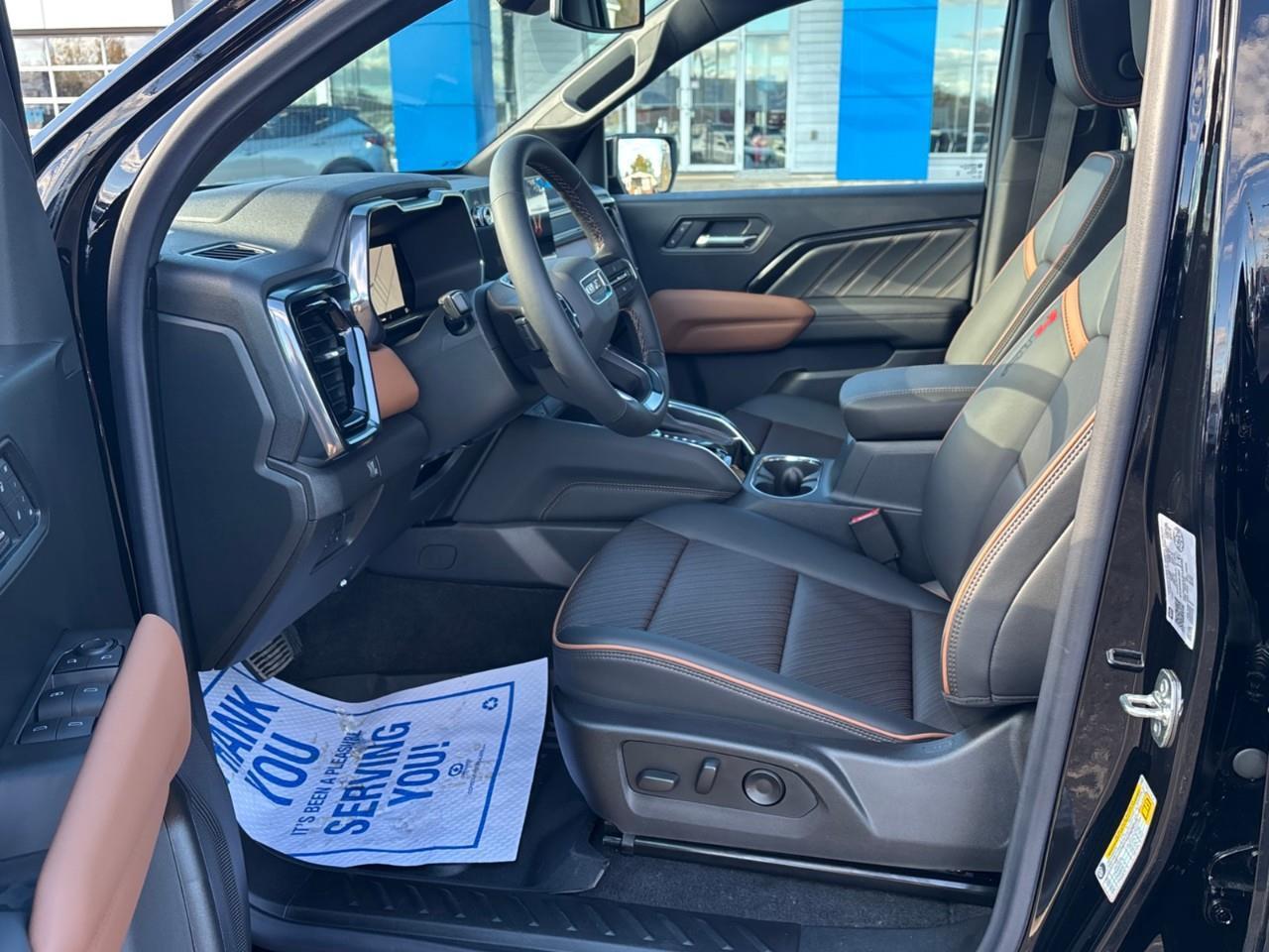 2026 GMC Canyon AT4 New 5 Passenger Mid Size 4X4 Crew Cab Truck with Heated and Ventilated Front Seats, Power Front Seats, Heated Steering Wheel, Adaptive Cruise Control, Power Sunroof and a 11 Diagonal Touchscreen Radio Photo
