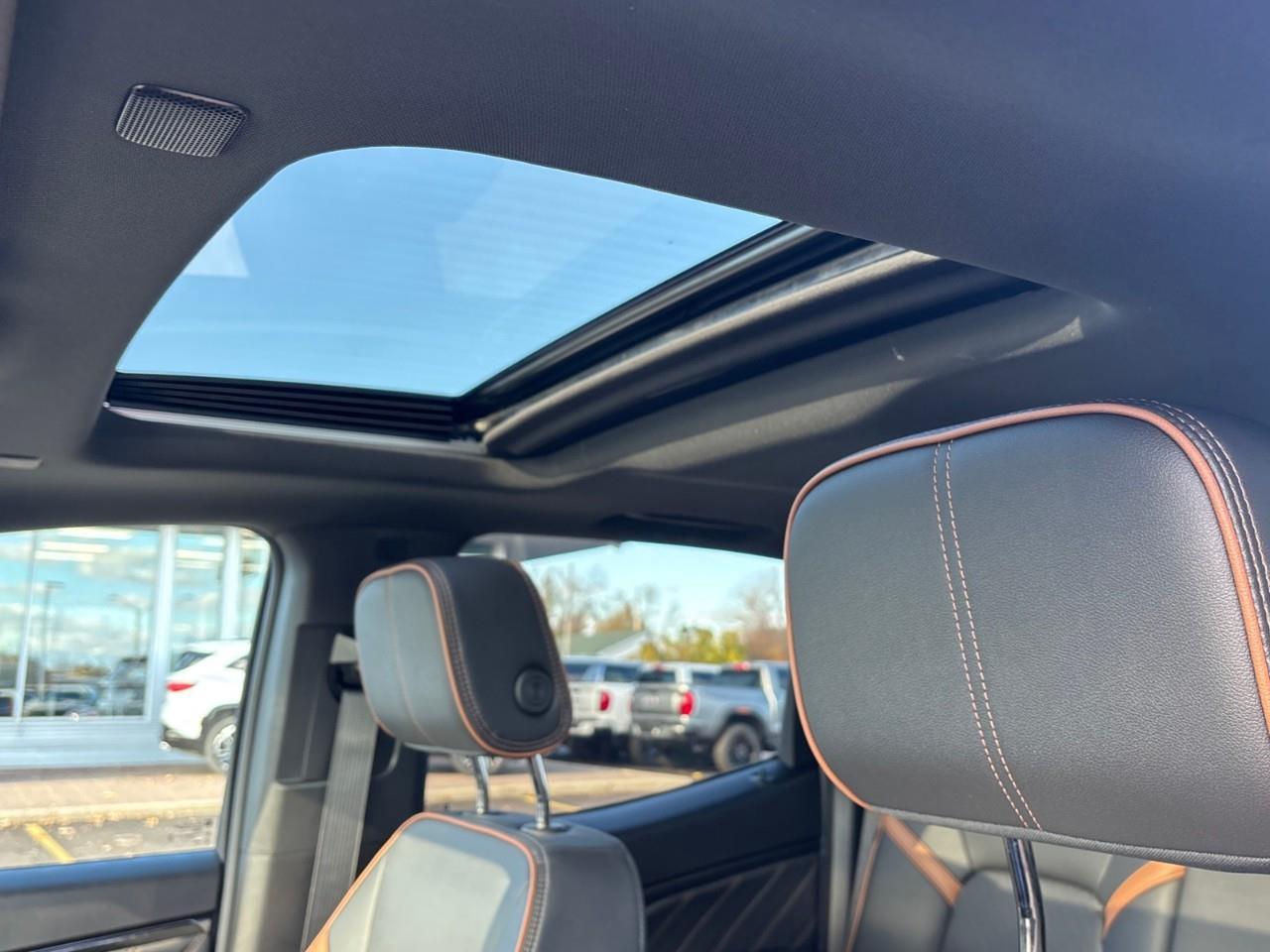 2026 GMC Canyon AT4 New 5 Passenger Mid Size 4X4 Crew Cab Truck with Heated and Ventilated Front Seats, Power Front Seats, Heated Steering Wheel, Adaptive Cruise Control, Power Sunroof and a 11 Diagonal Touchscreen Radio Photo