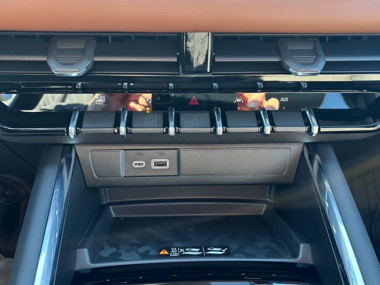 2026 GMC Canyon AT4 New 5 Passenger Mid Size 4X4 Crew Cab Truck with Heated and Ventilated Front Seats, Power Front Seats, Heated Steering Wheel, Adaptive Cruise Control, Power Sunroof and a 11 Diagonal Touchscreen Radio Photo