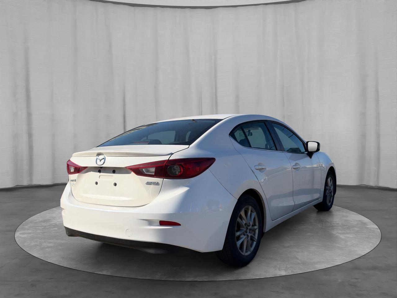 2014 Mazda MAZDA3 4DR SDN MAN GS-SKY Photo