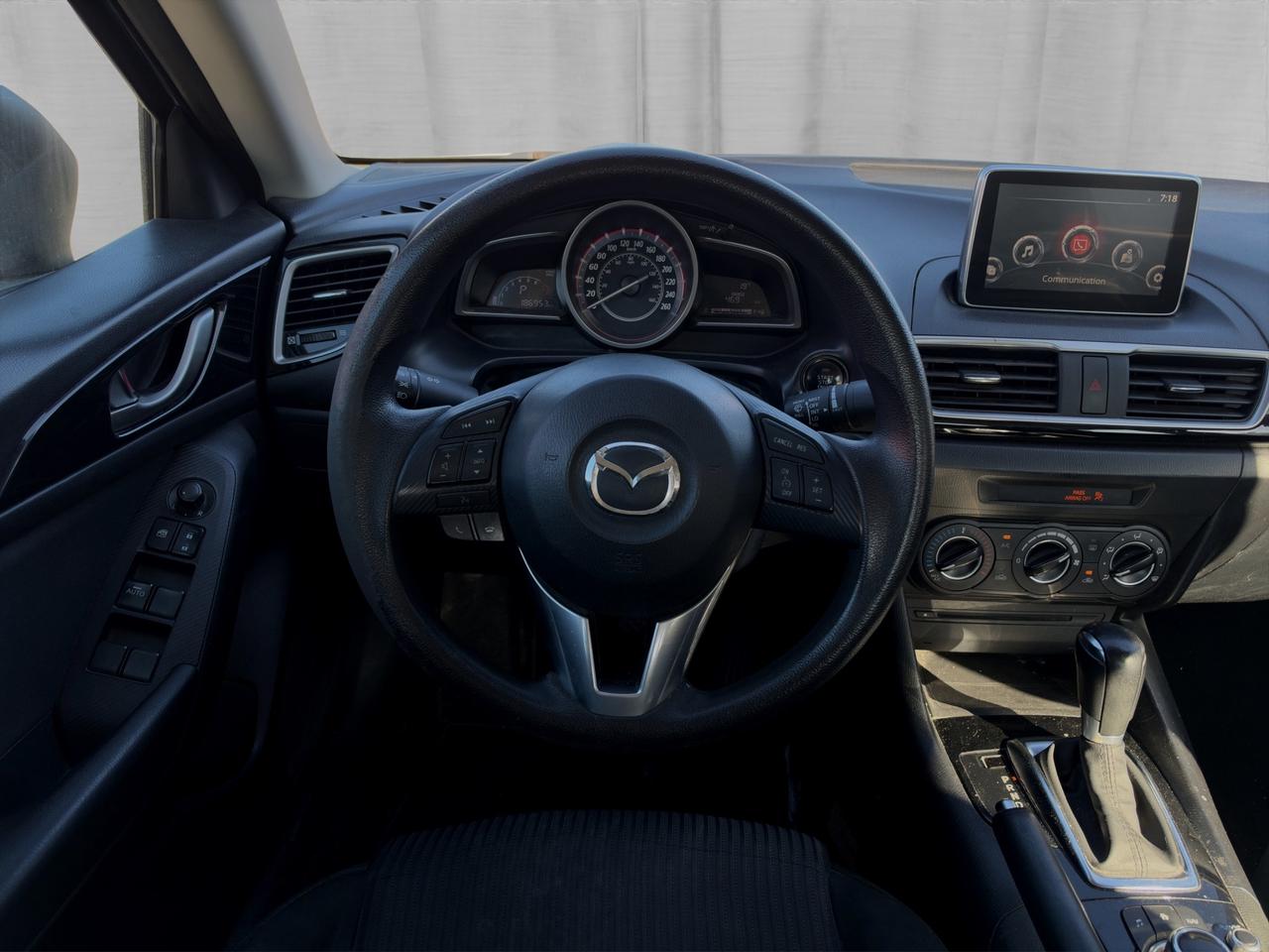 2014 Mazda MAZDA3 4DR SDN MAN GS-SKY Photo