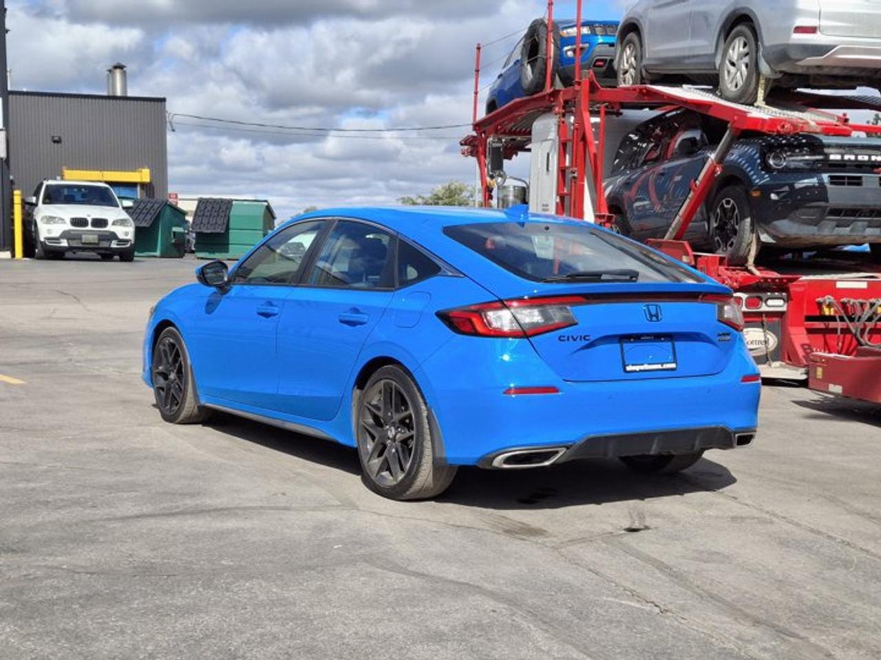2023 Honda Civic Hatchback Sport Touring | Manual | Sunroof | Leather | Heated Seats + Steering | Adaptive Cruise | and More ! Photo