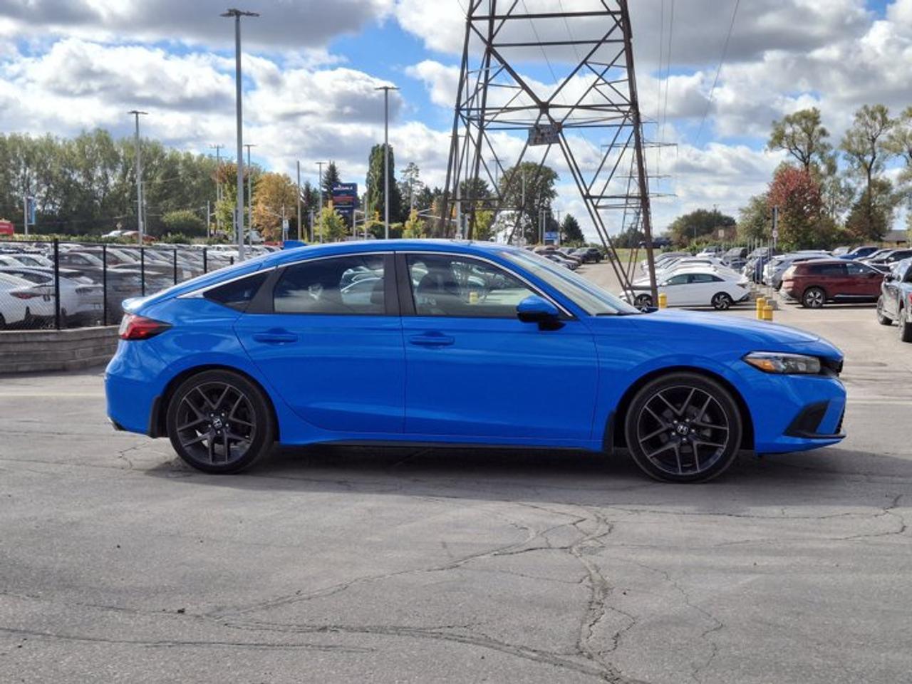 2023 Honda Civic Hatchback Sport Touring | Manual | Sunroof | Leather | Heated Seats + Steering | Adaptive Cruise | and More ! Photo