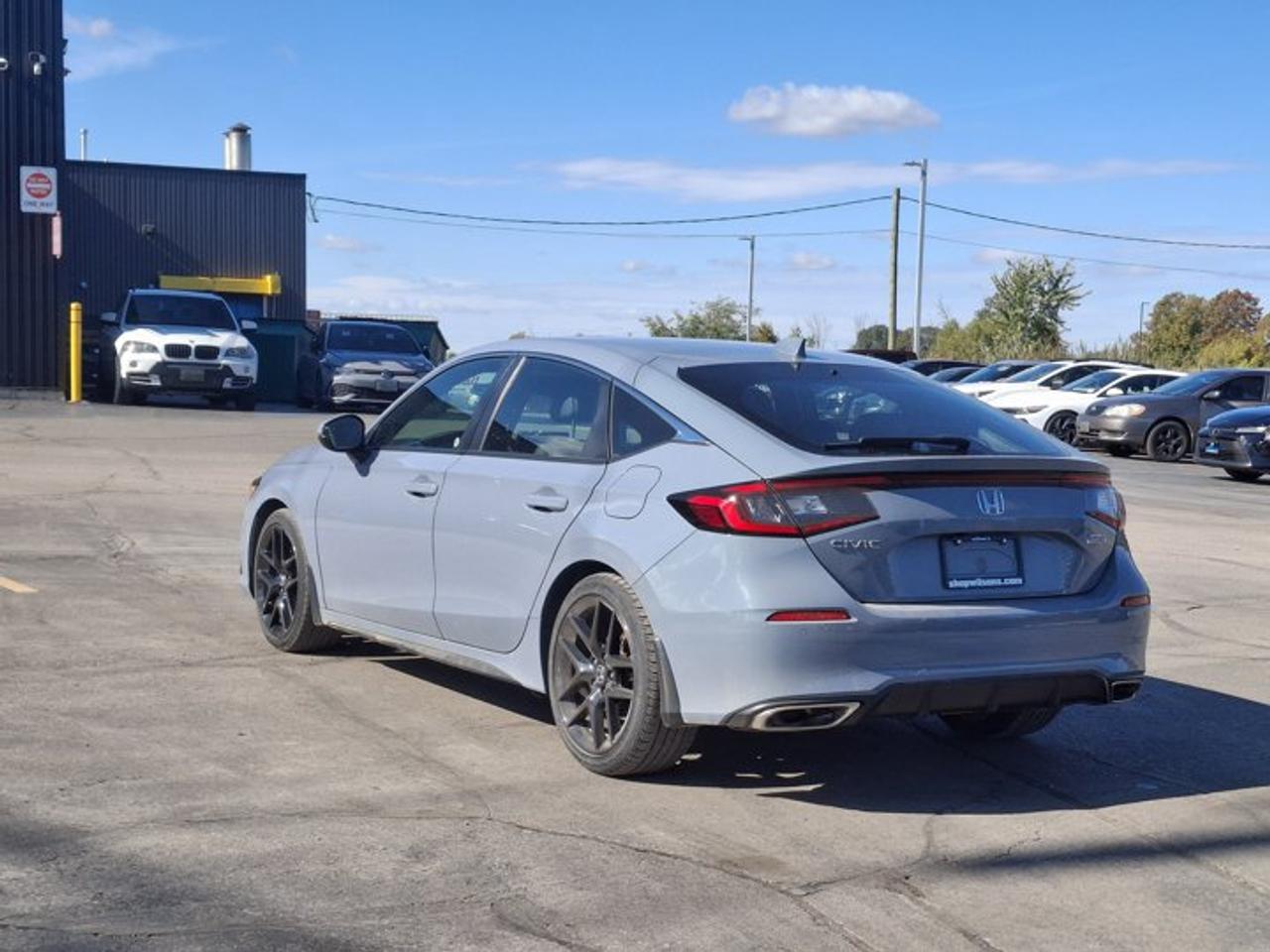 2022 Honda Civic Hatchback Sport Touring | 6-Speed Manual | Leather | Sunroof | Nav | Power Seat | Adaptive Cruise | and More ! Photo