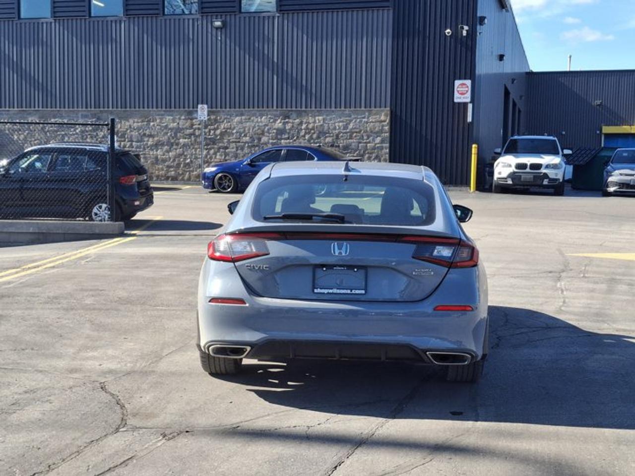 2022 Honda Civic Hatchback Sport Touring | 6-Speed Manual | Leather | Sunroof | Nav | Power Seat | Adaptive Cruise | and More ! Photo