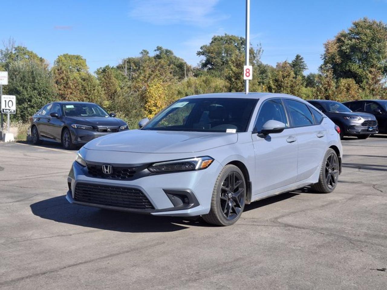 2022 Honda Civic Hatchback Sport Touring | 6-Speed Manual | Leather | Sunroof | Nav | Power Seat | Adaptive Cruise | and More ! Photo