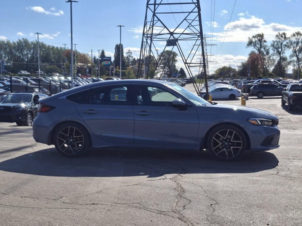 2022 Honda Civic Hatchback Sport Touring | 6-Speed Manual | Leather | Sunroof | Nav | Power Seat | Adaptive Cruise | and More ! Photo