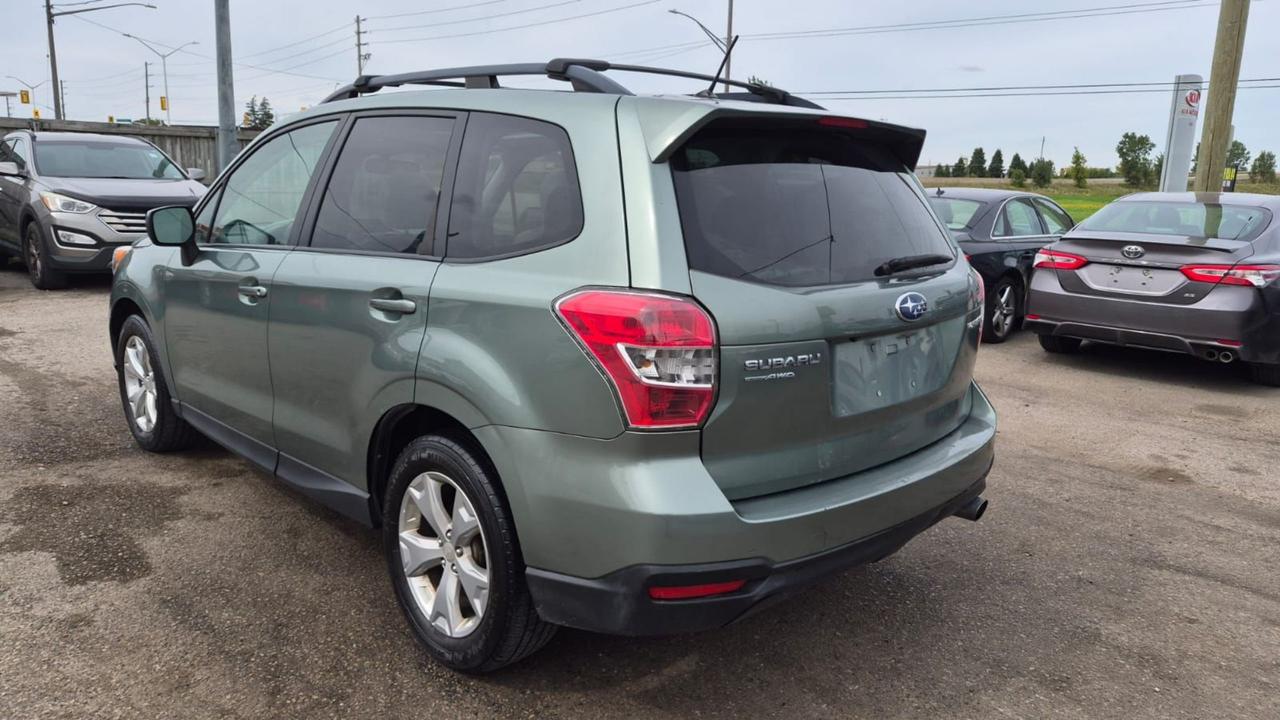 2015 Subaru Forester TOURING, TECH, MOONROOF, 2 SETS WHEELS, CERT Photo