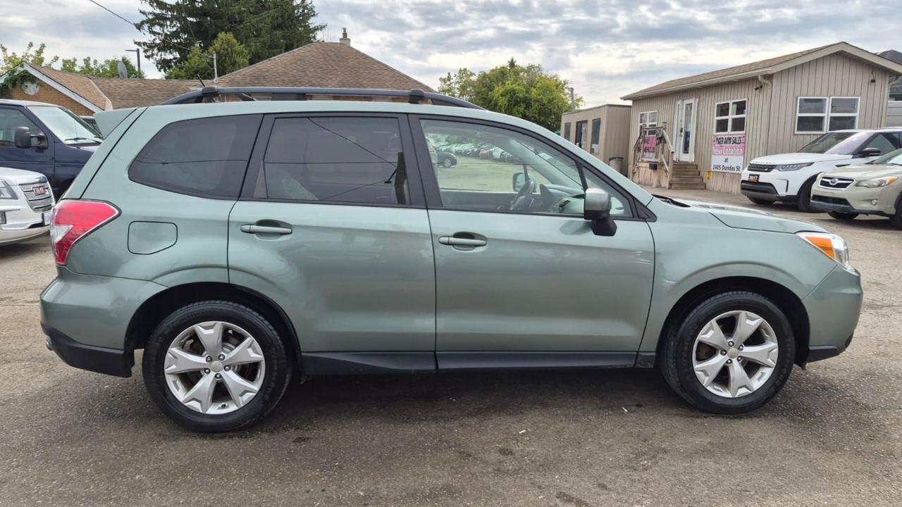 2015 Subaru Forester TOURING, TECH, MOONROOF, 2 SETS WHEELS, CERT Photo