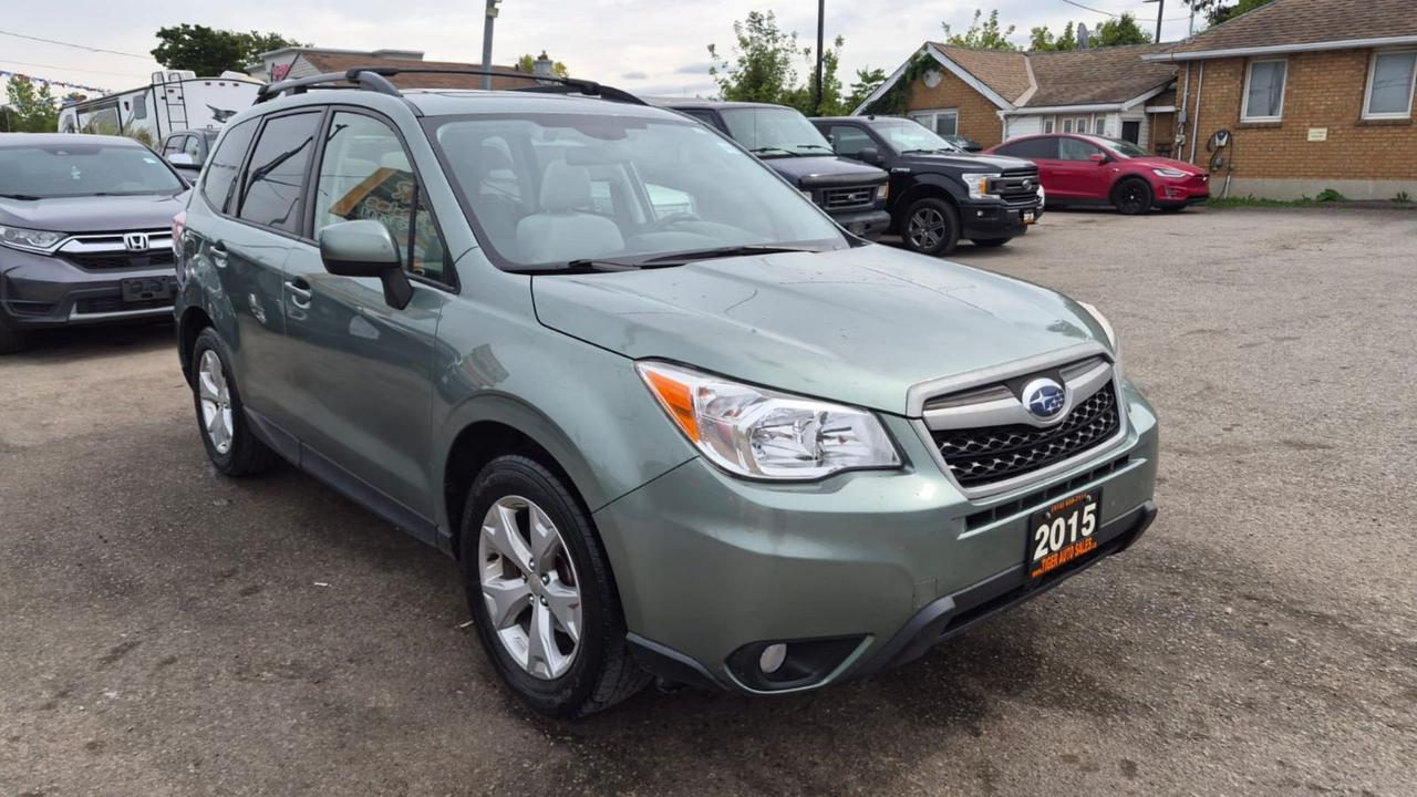2015 Subaru Forester TOURING, TECH, MOONROOF, 2 SETS WHEELS, CERT Photo
