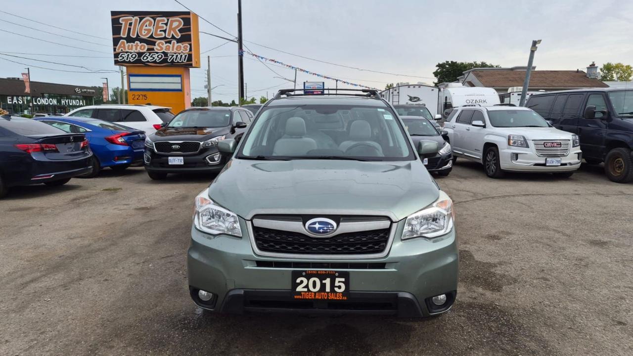 2015 Subaru Forester TOURING, TECH, MOONROOF, 2 SETS WHEELS, CERT Photo