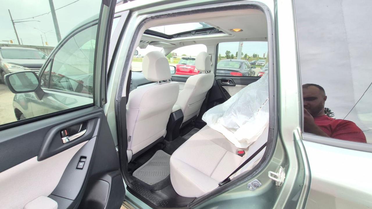2015 Subaru Forester TOURING, TECH, MOONROOF, 2 SETS WHEELS, CERT Photo