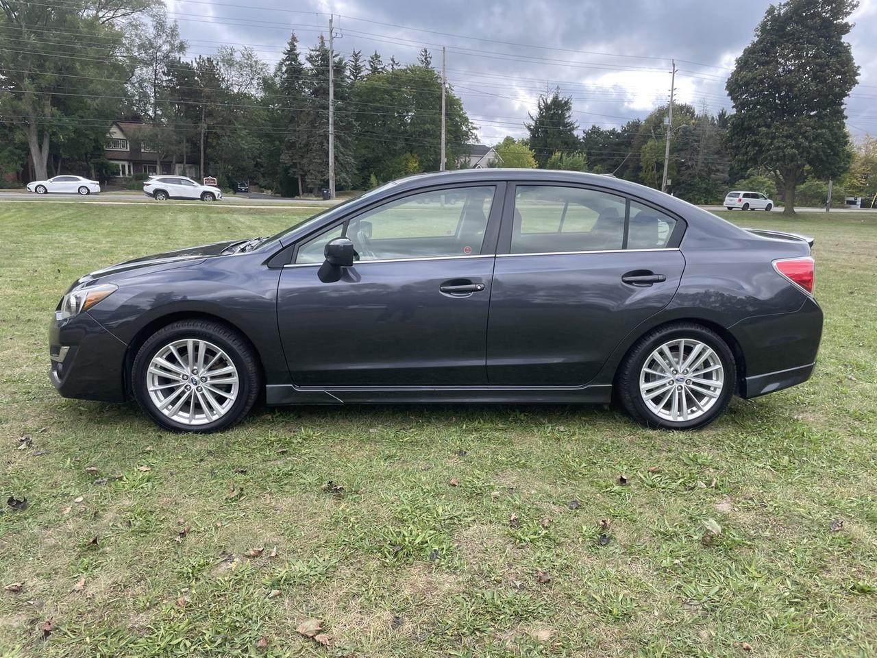 2016 Subaru Impreza 2.0i Premium PZEV 4-Door *ONE owner Photo2