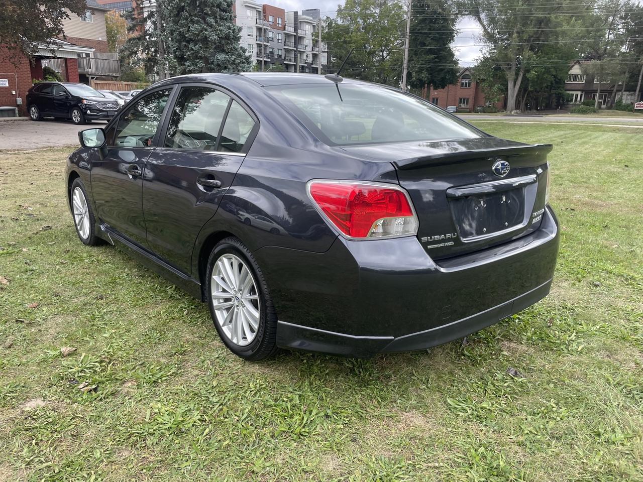 2016 Subaru Impreza 2.0i Premium PZEV 4-Door *ONE owner Photo