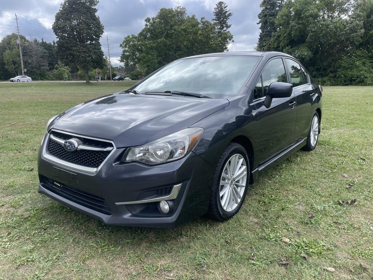 2016 Subaru Impreza 2.0i Premium PZEV 4-Door *ONE owner - Photo #1