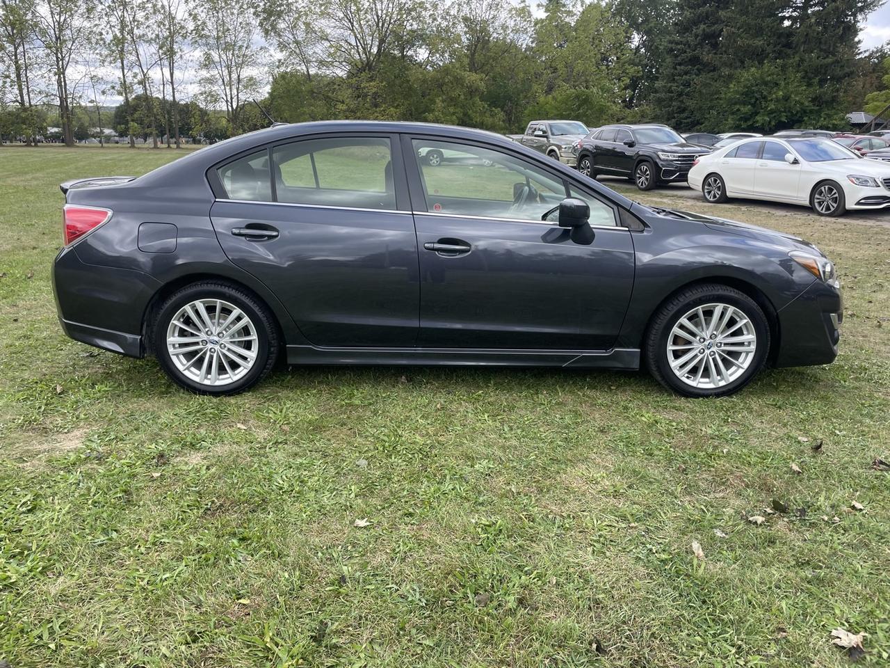 2016 Subaru Impreza 2.0i Premium PZEV 4-Door *ONE owner Photo