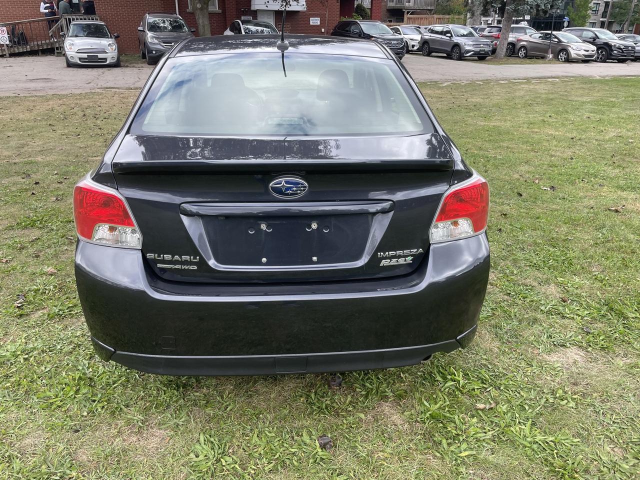 2016 Subaru Impreza 2.0i Premium PZEV 4-Door *ONE owner Photo