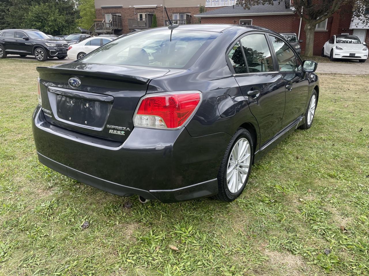 2016 Subaru Impreza 2.0i Premium PZEV 4-Door *ONE owner Photo