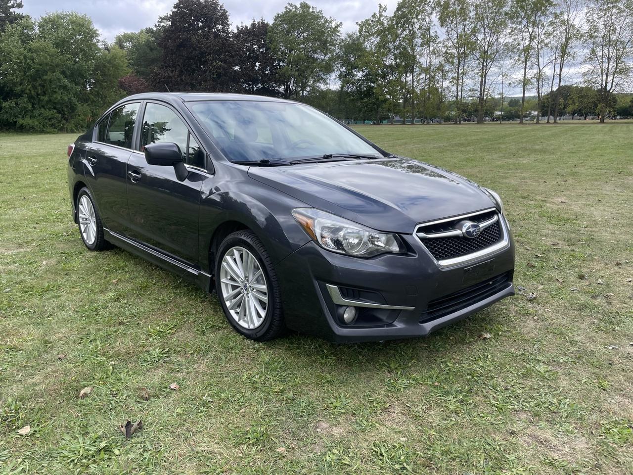 2016 Subaru Impreza 2.0i Premium PZEV 4-Door *ONE owner Photo