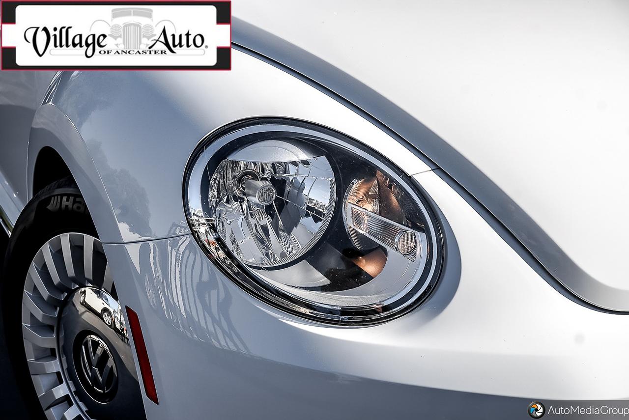 2016 Volkswagen Beetle 2dr Conv Denim Edition Photo