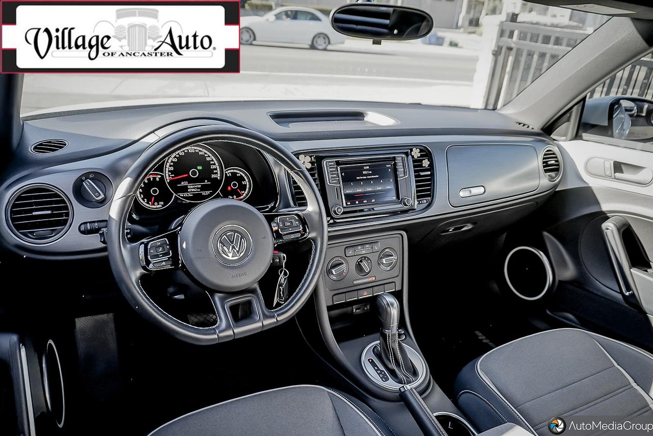 2016 Volkswagen Beetle 2dr Conv Denim Edition Photo