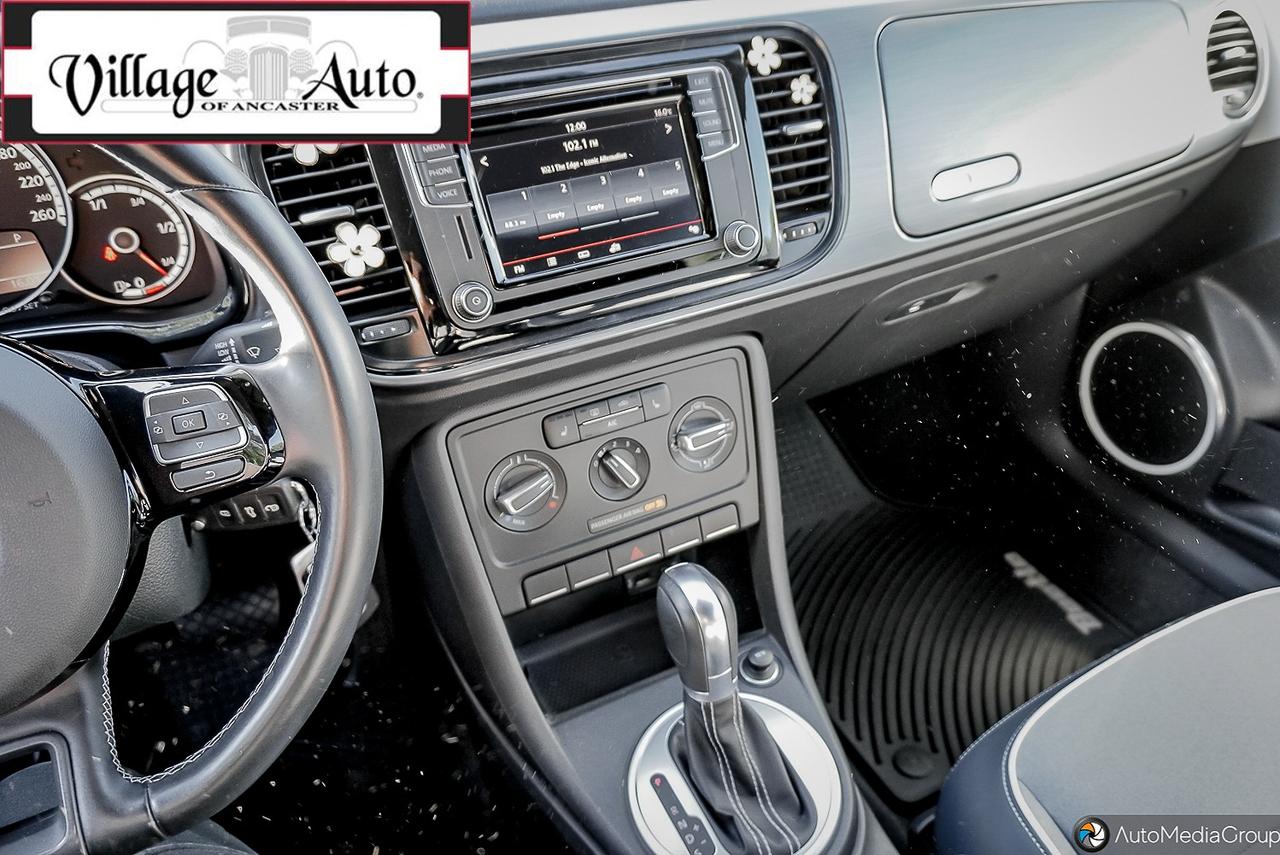 2016 Volkswagen Beetle 2dr Conv Denim Edition Photo