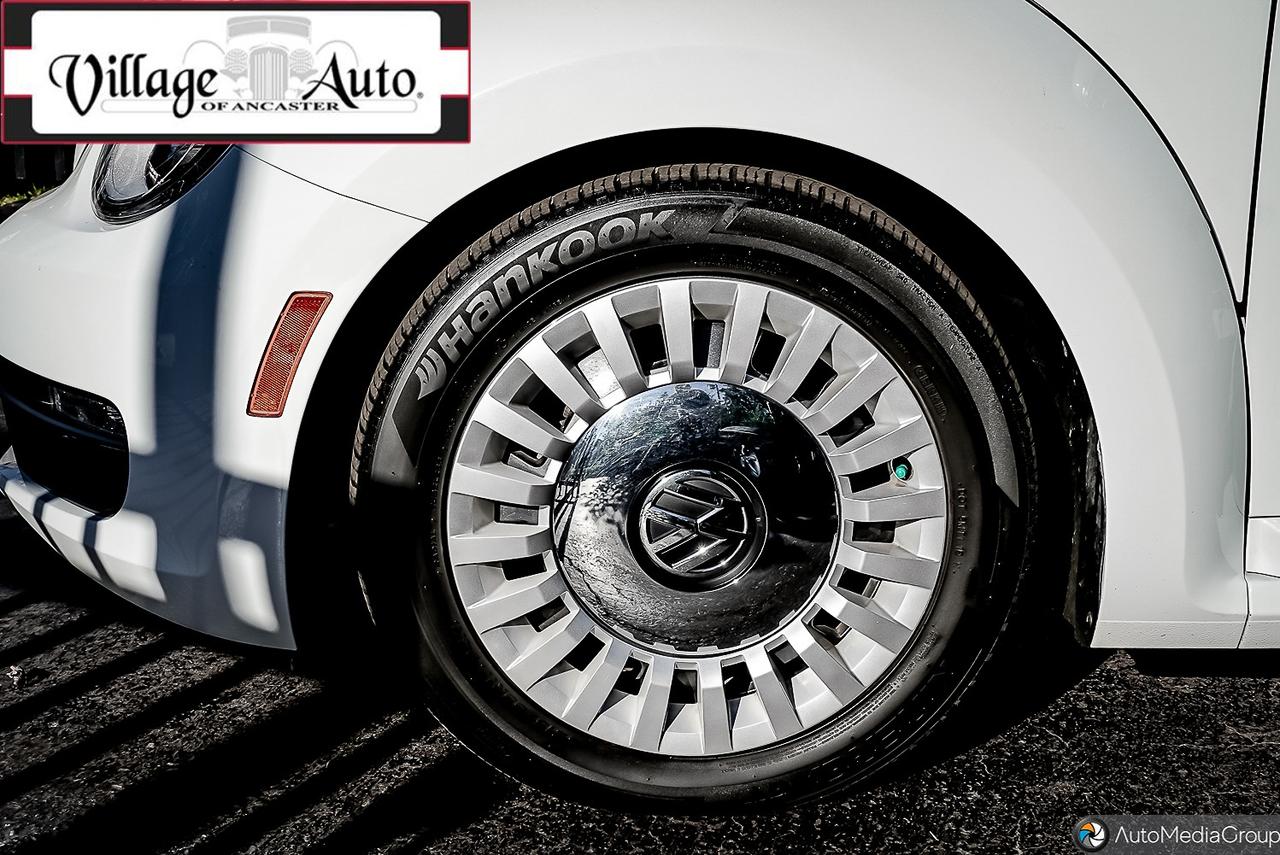 2016 Volkswagen Beetle 2dr Conv Denim Edition Photo