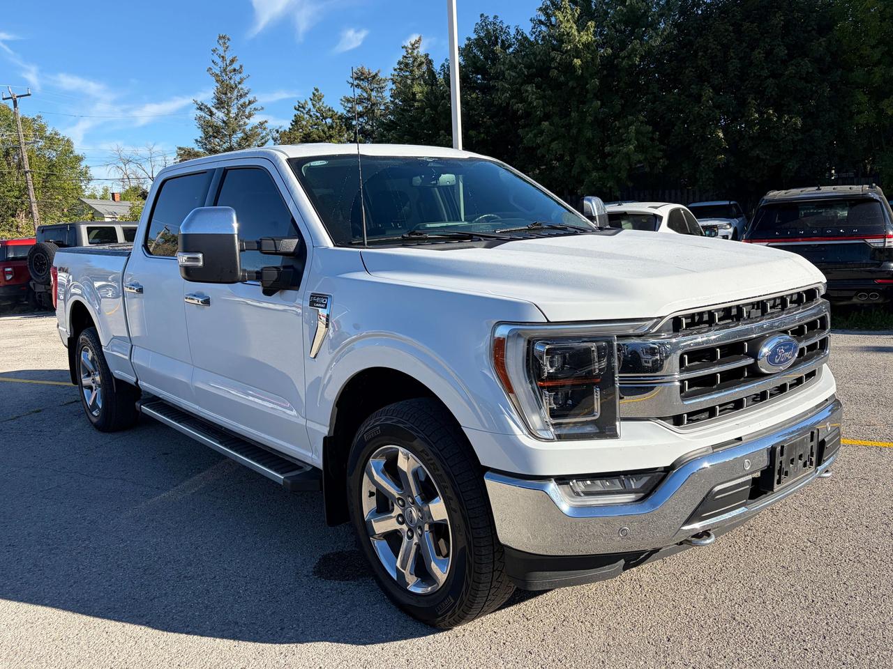 2023 Ford F-150 Lariat 4WD SuperCrew 6.5' Box w/ Tow Mirrors Photo