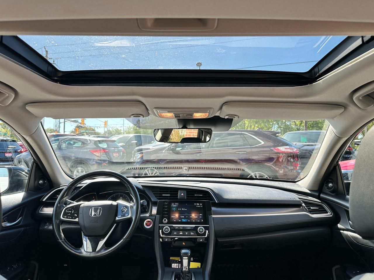 2020 Honda Civic Touring Sunroof Heated Leather SafetyFeatures NAV Photo