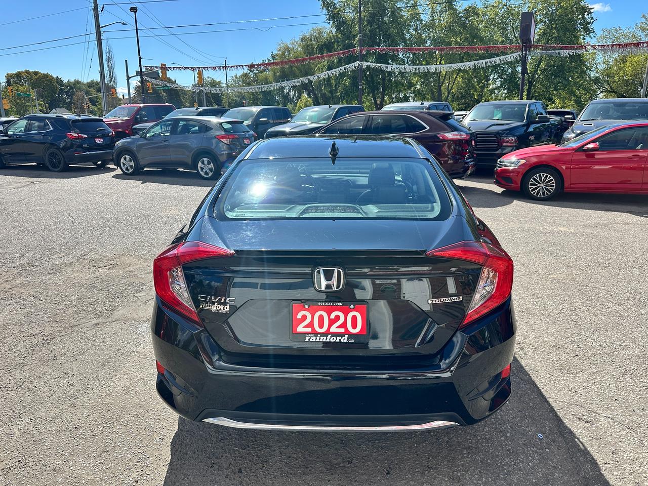 2020 Honda Civic Touring Sunroof Heated Leather SafetyFeatures NAV Photo