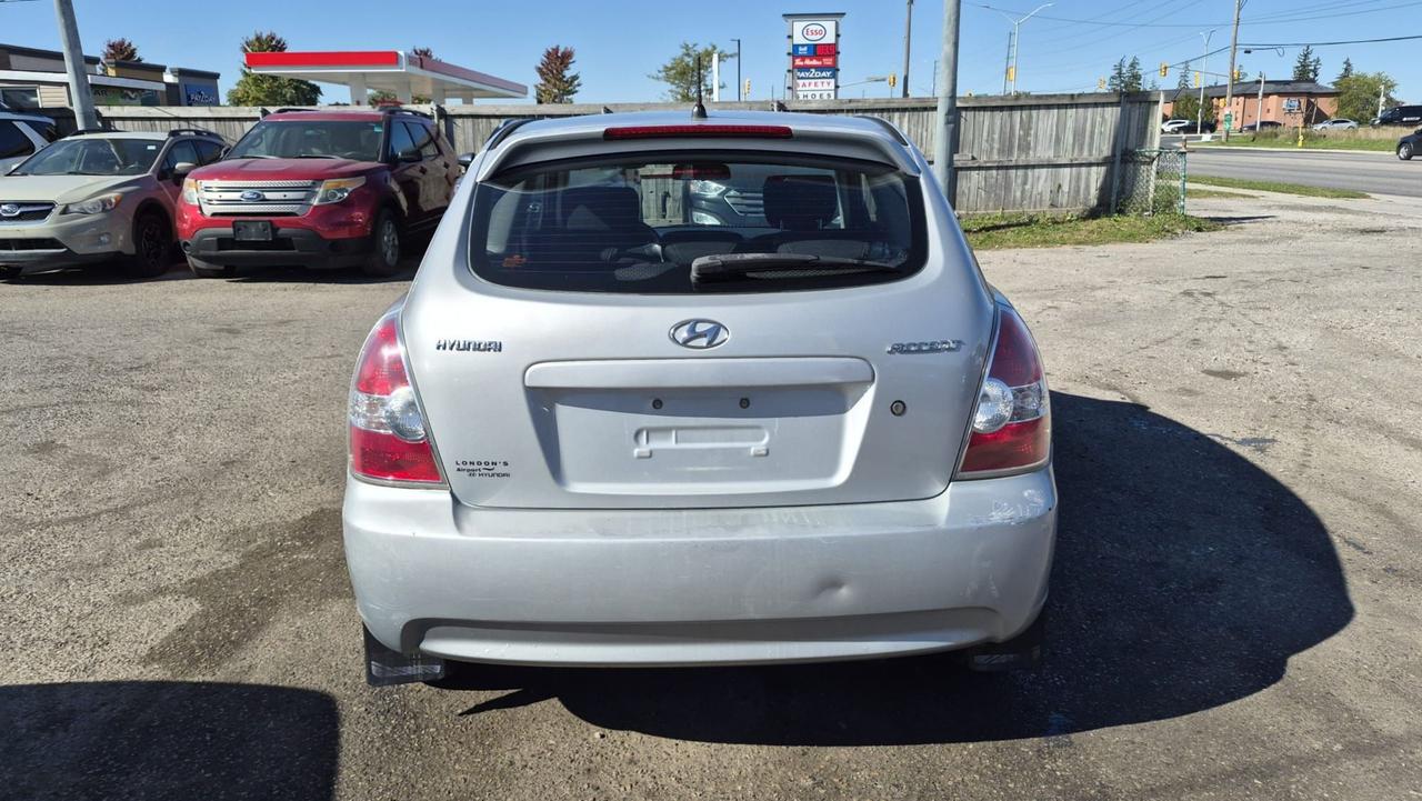 2009 Hyundai Accent AUTO, HATCH, GREAT ON FUEL, AS IS SPECIAL Photo
