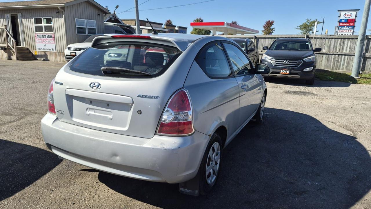 2009 Hyundai Accent AUTO, HATCH, GREAT ON FUEL, AS IS SPECIAL Photo