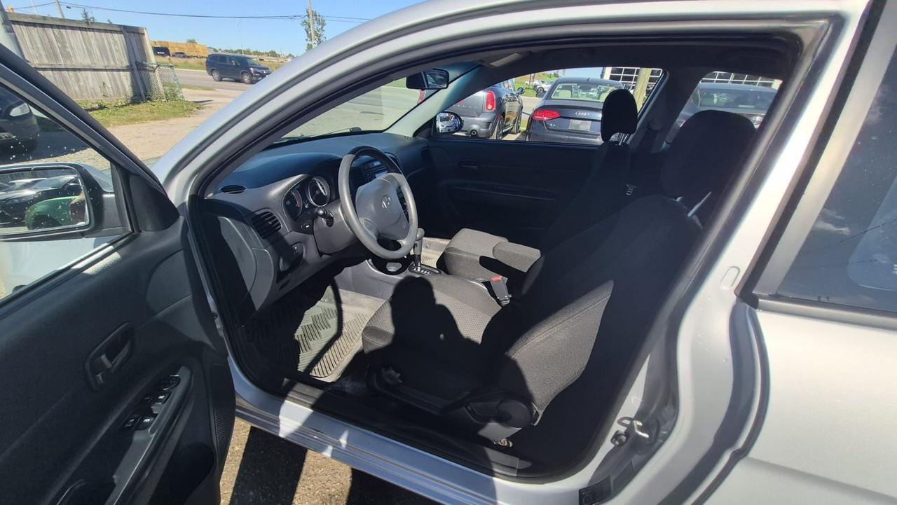 2009 Hyundai Accent AUTO, HATCH, GREAT ON FUEL, AS IS SPECIAL Photo