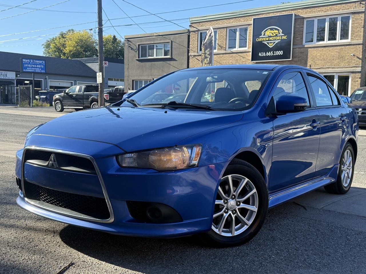 Blue 2015 Mitsubishi Lancer Sedan Front-Wheel Drive Continuously Variable Transmission