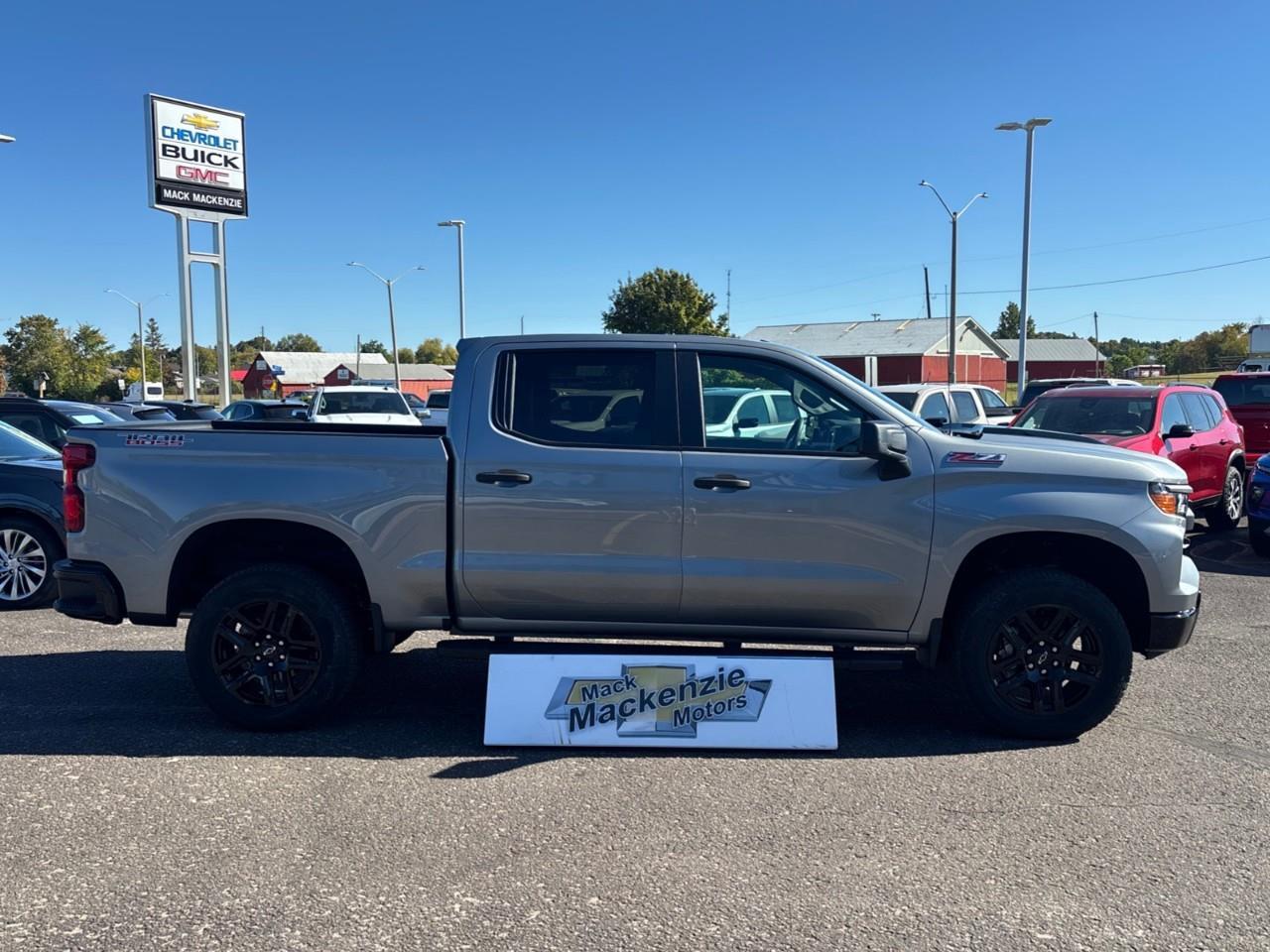 2026 Chevrolet Silverado 1500 Custom Trail Boss New 2026 Gas Powered V8 6 Passenger Crew Cab 4X4 Truck with a 2 Factory Installed Lift, Push Button Start with Remote Vehicle Start and a 7 Diagonal Touchscreen Radio with Wireless Apple CarPlay and W Photo