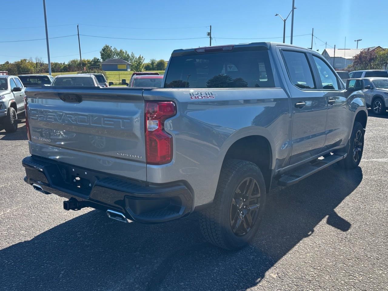 2026 Chevrolet Silverado 1500 Custom Trail Boss New 2026 Gas Powered V8 6 Passenger Crew Cab 4X4 Truck with a 2 Factory Installed Lift, Push Button Start with Remote Vehicle Start and a 7 Diagonal Touchscreen Radio with Wireless Apple CarPlay and W Photo3